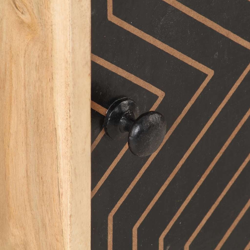 Gros plan de la porte noire aux lignes géométriques et du bouton de la table de chevet Comète