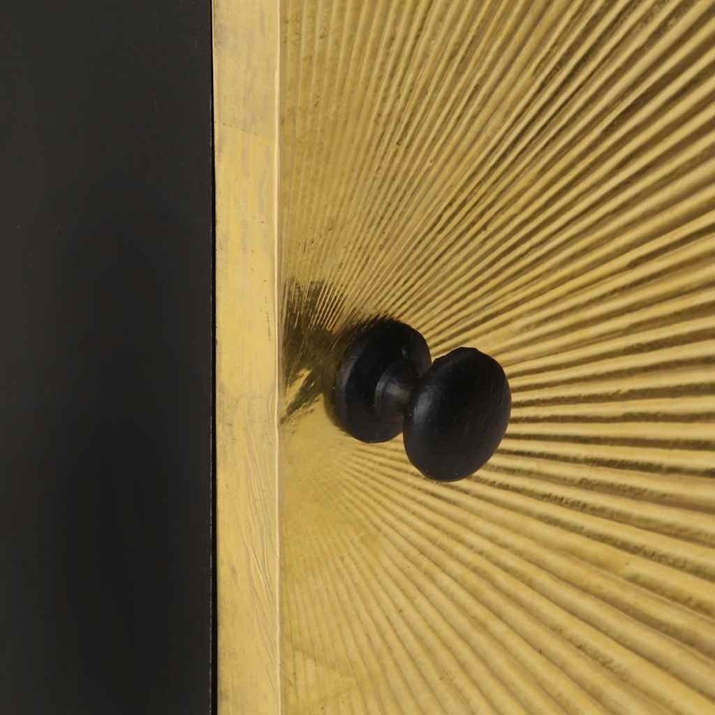 Gros plan du laiton rayonnant et du bouton de la table de chevet Éclipse