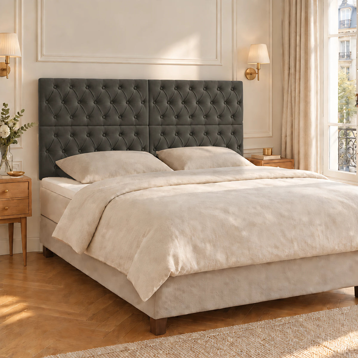 Tête de lit haute capitonnée en velours Concorde gris anthracite dans une chambre parisienne