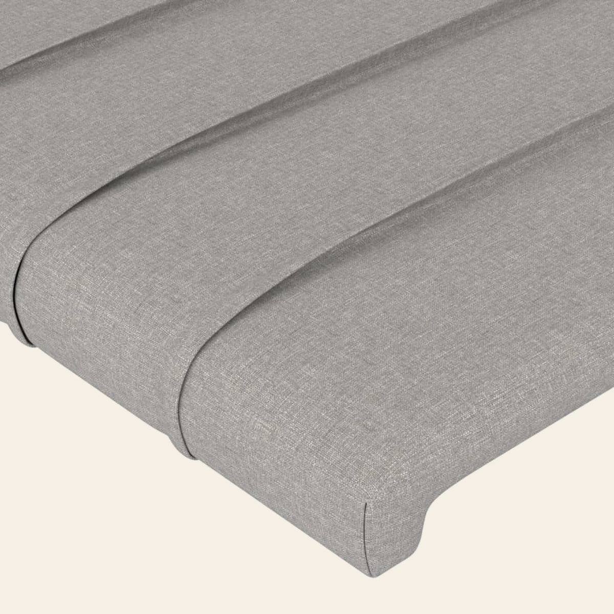 Gros plan du tissu gris clair de la tête de lit Bagatelle
