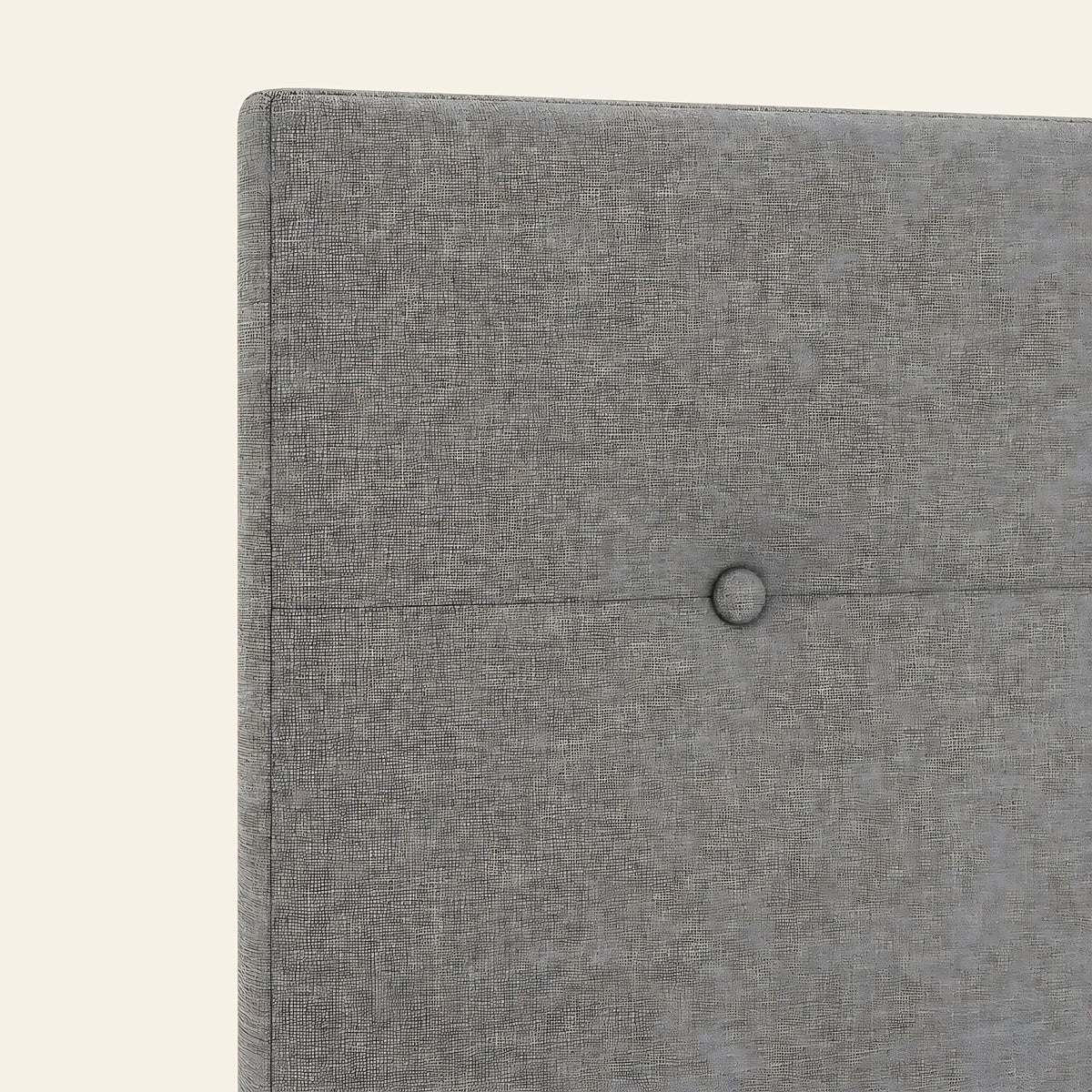Gros plan du tissu chiné taupe et de son bouton, tête de lit Marais