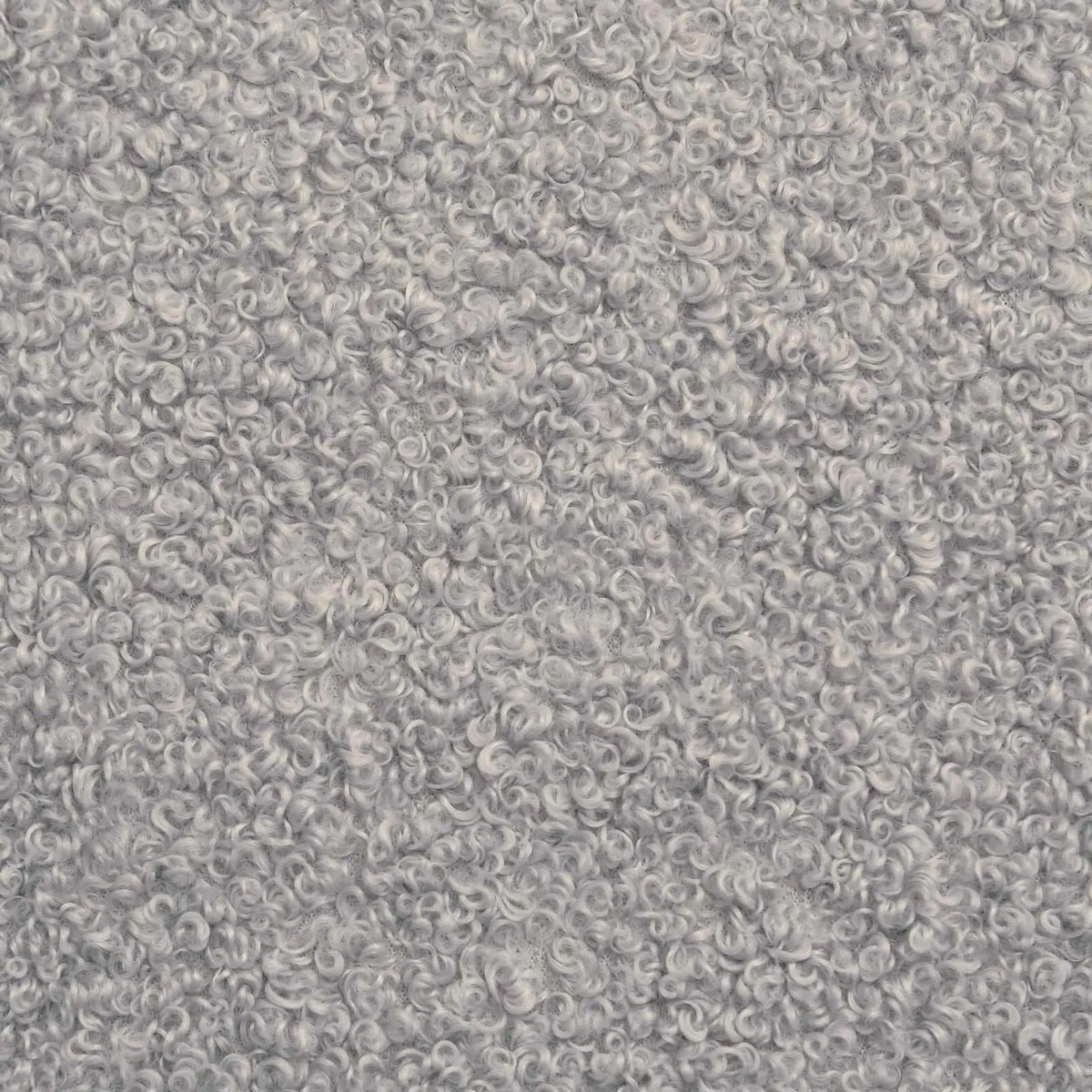Gros plan sur le tissu bouclé gris clair du banc de lit Véro-Dodat