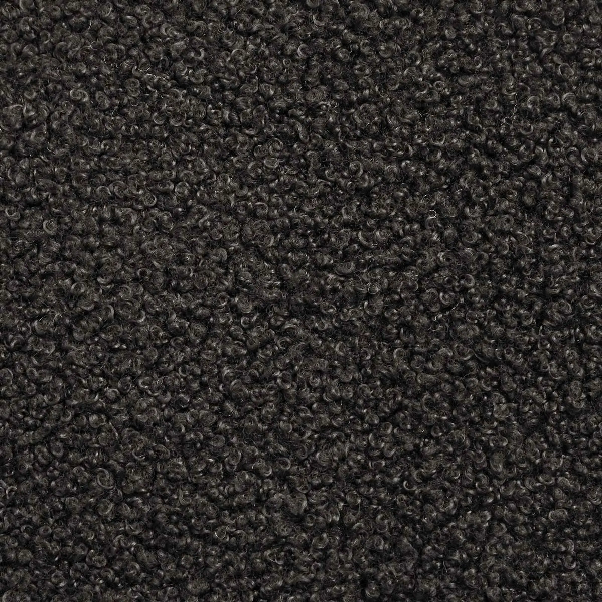 Gros plan sur le tissu bouclé noir du banc de lit Véro-Dodat